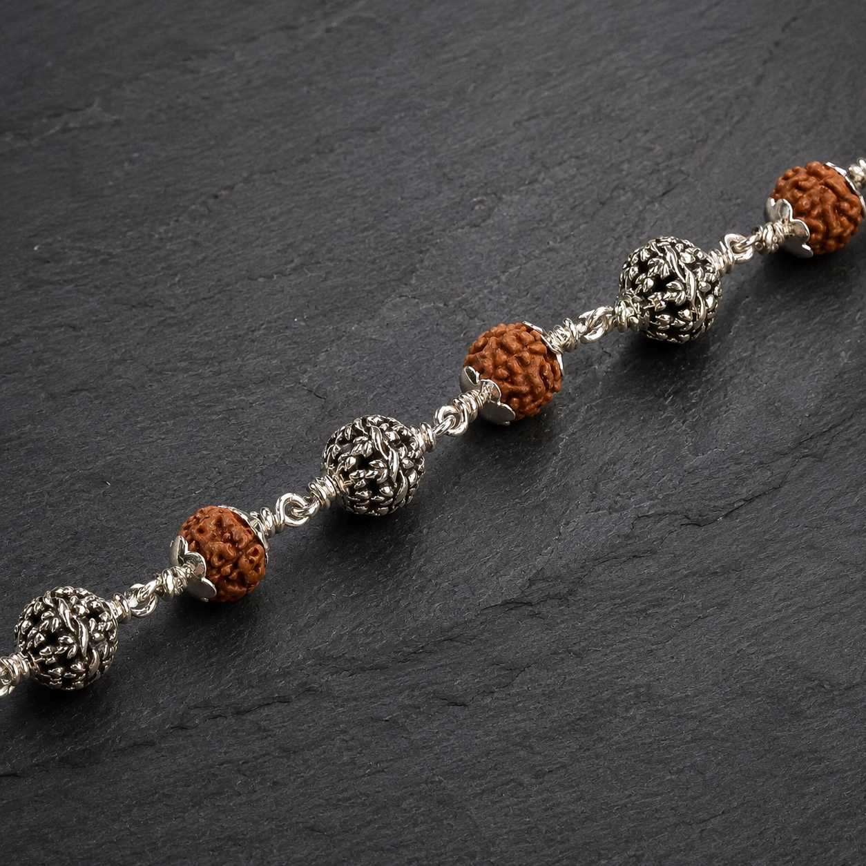 5 Mukhi Rudraksha bracelet with 925 silver flower beads,