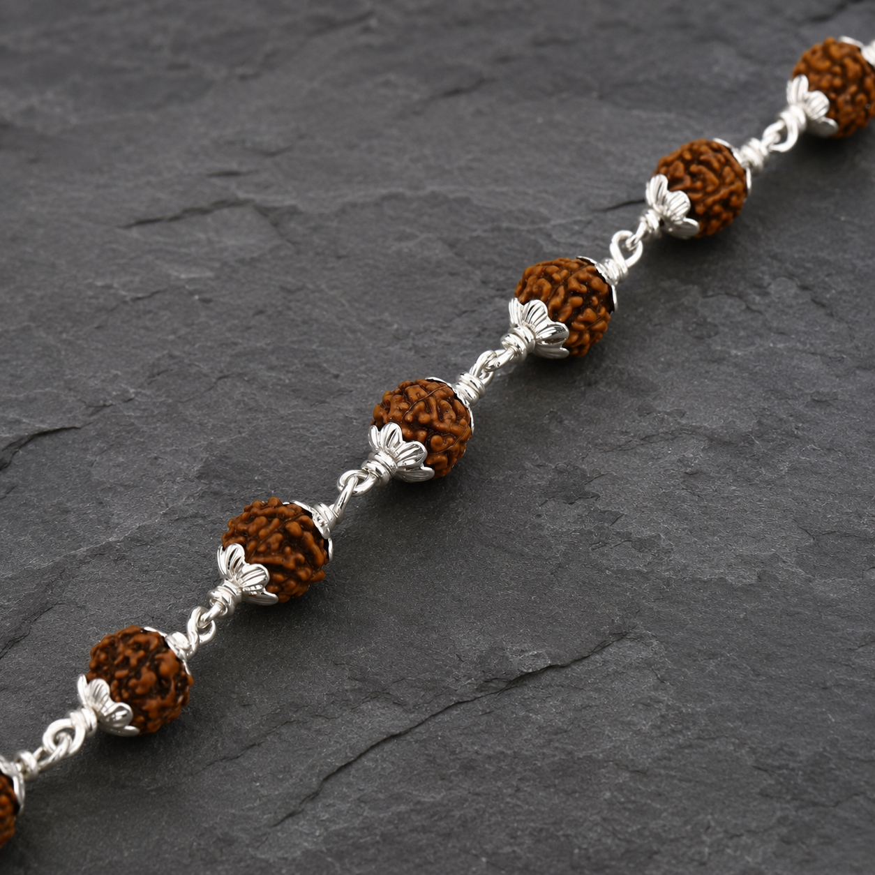 5 Mukhi Rudraksha bracelet with decorative 925 silver caps