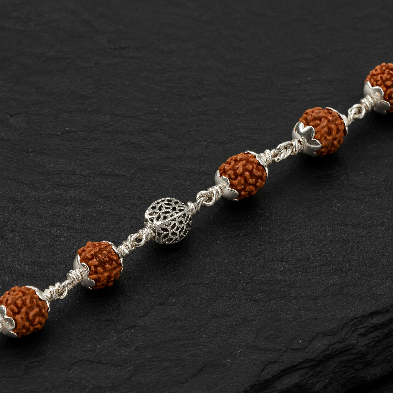 5 Mukhi Rudraksha bracelet with hollow circular 925 silver beads,