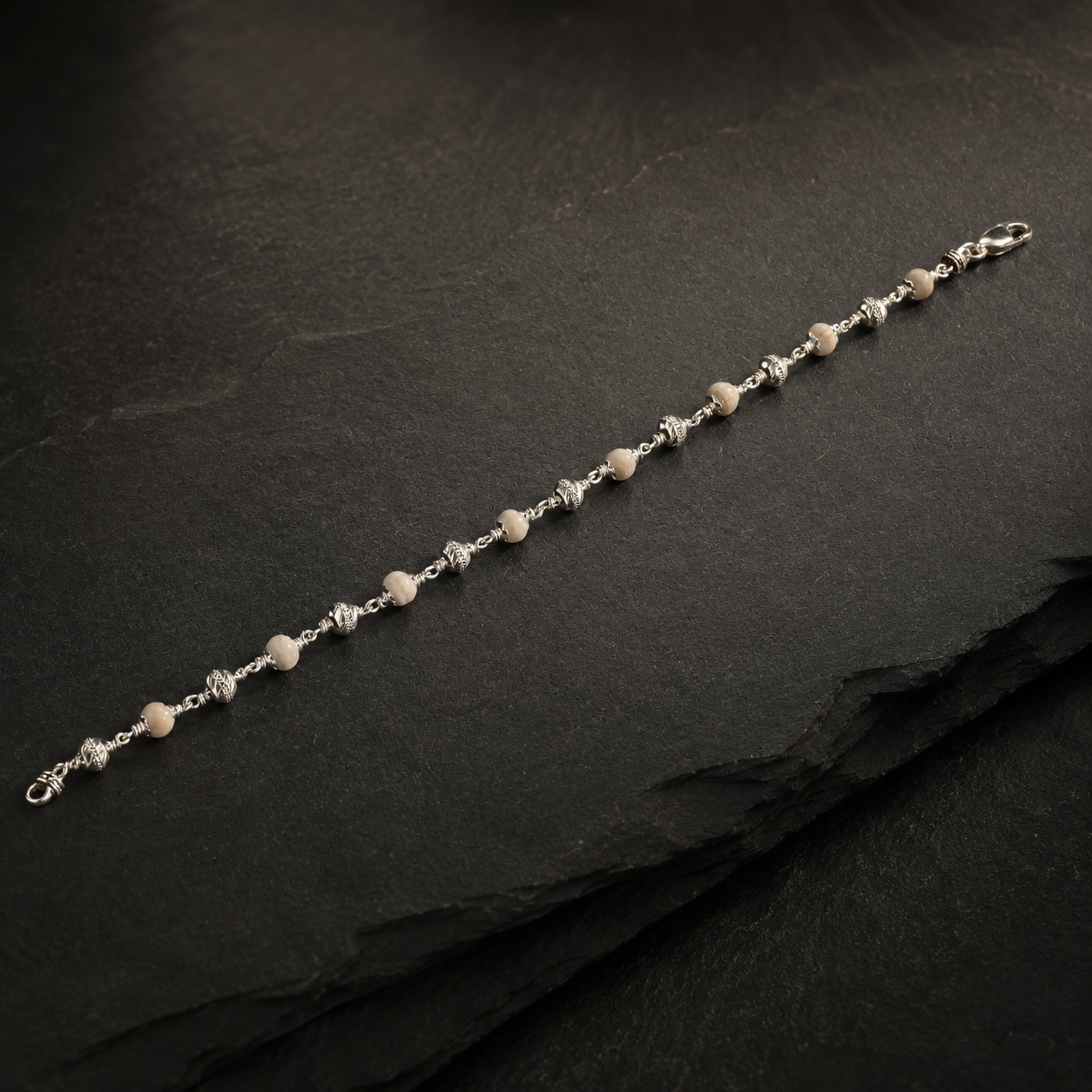 Close-up of Tulsi beads with 925 silver CNC details