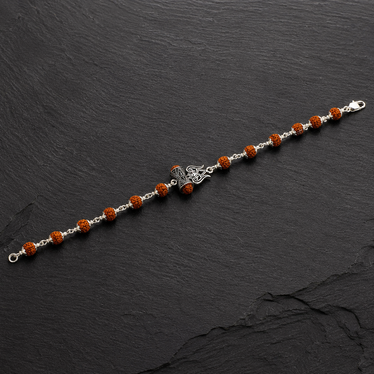 Full view of 15 bead Rudraksha bracelet with silver centerpiece