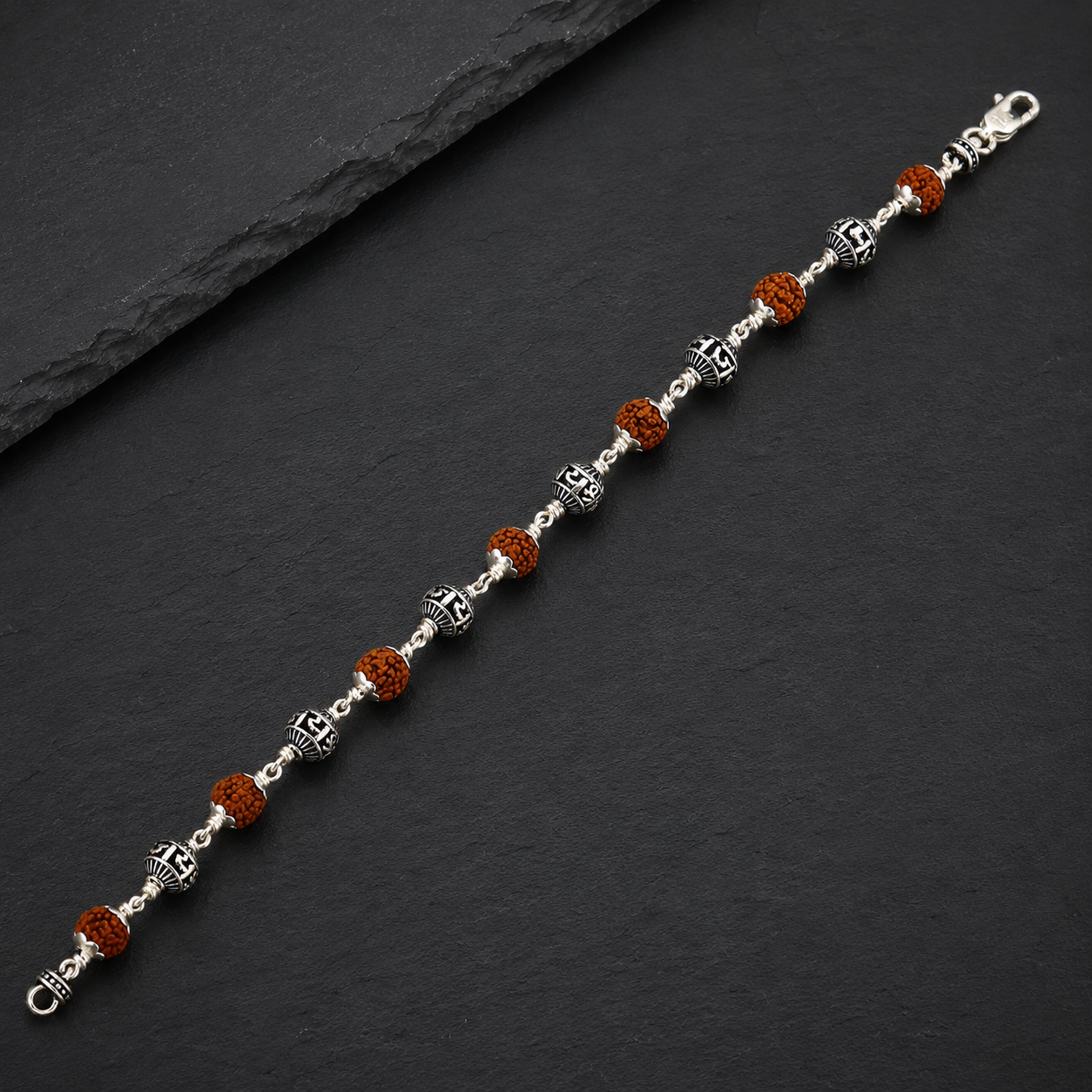 Full view of 7 Rudraksha and 6 silver mantra bead bracelet