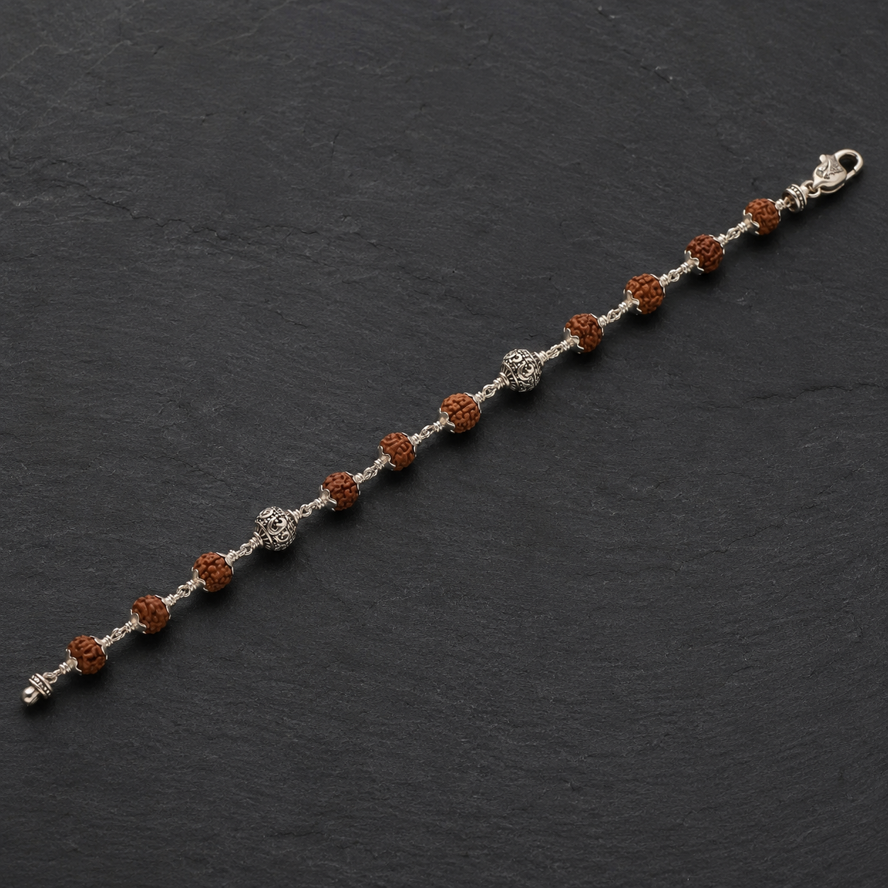 Full view of natural Rudraksha and silver Om bead bracelet