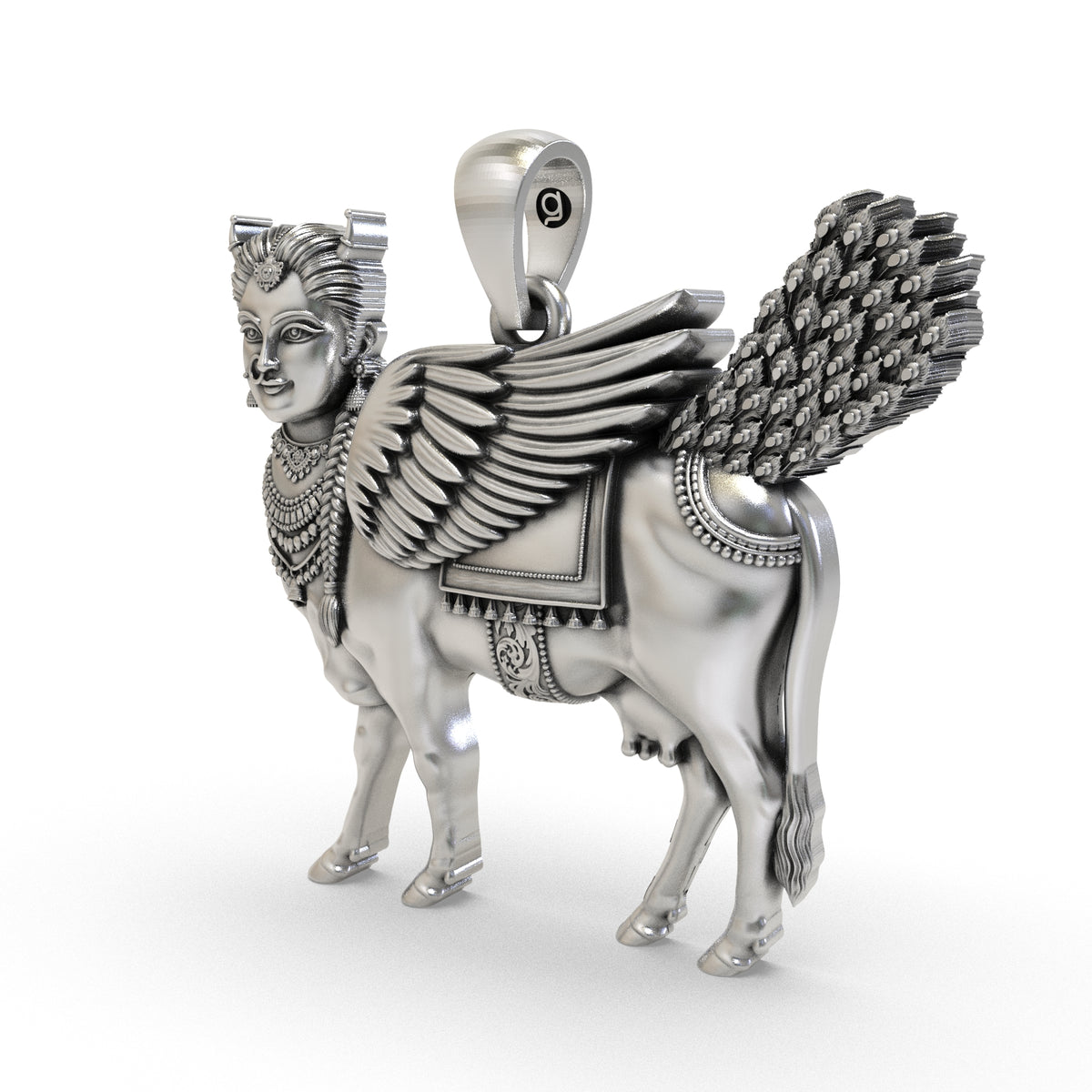 Angled view of Kamadhenu sterling silver pendant