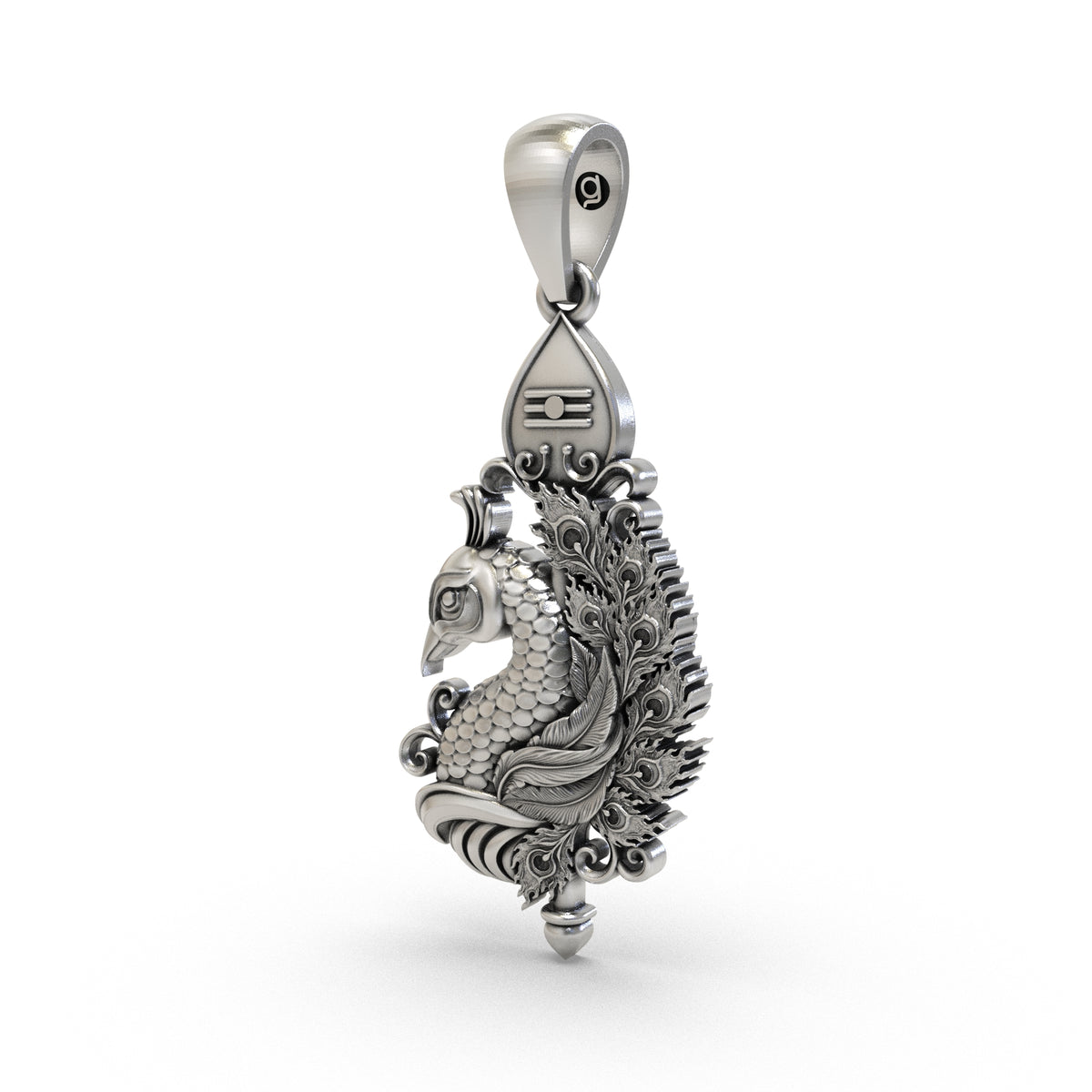 Angled view of a silver Vel and peacock pendant showing its sculpted detailing