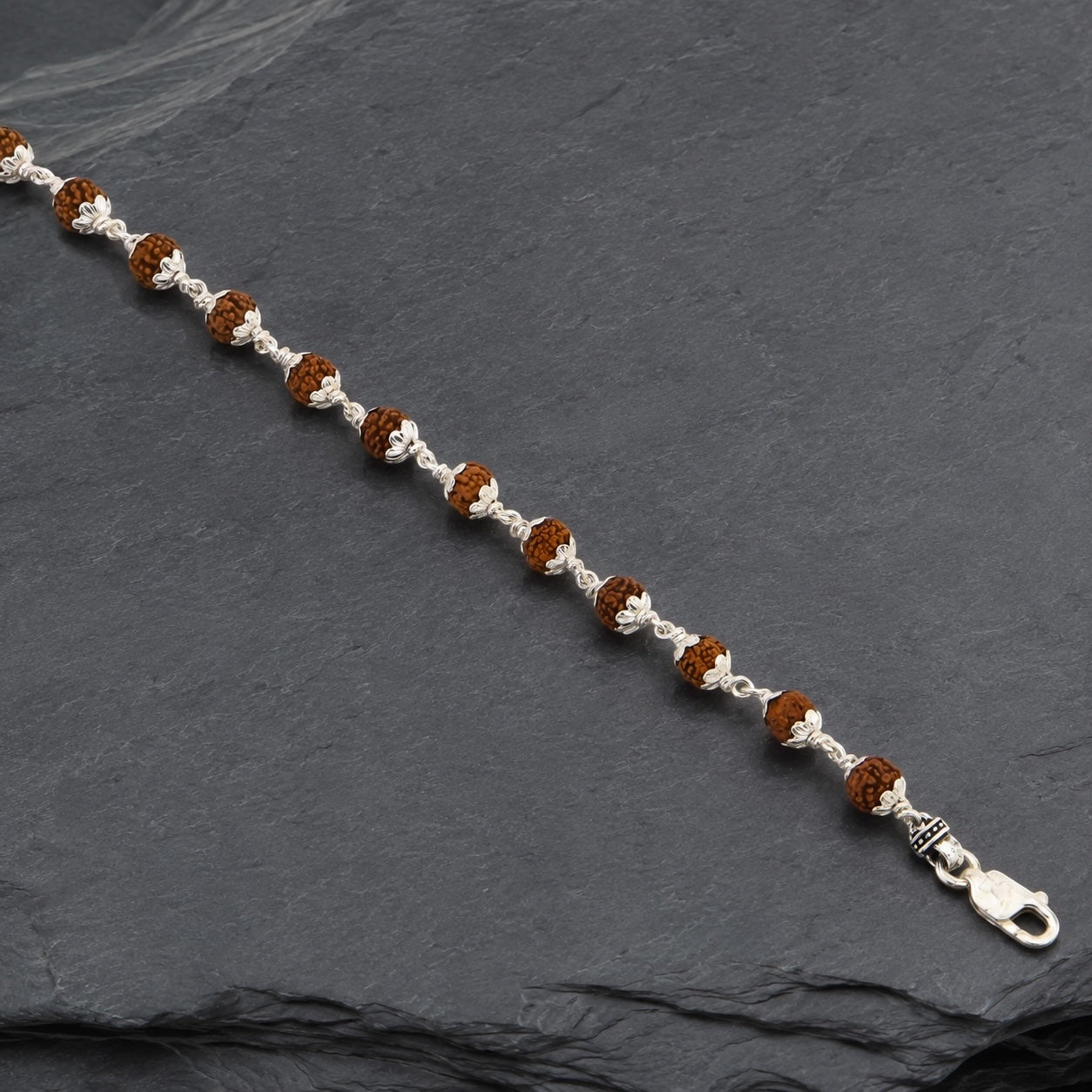 Full view of 16 bead Rudraksha silver bracelet with lobster clasp