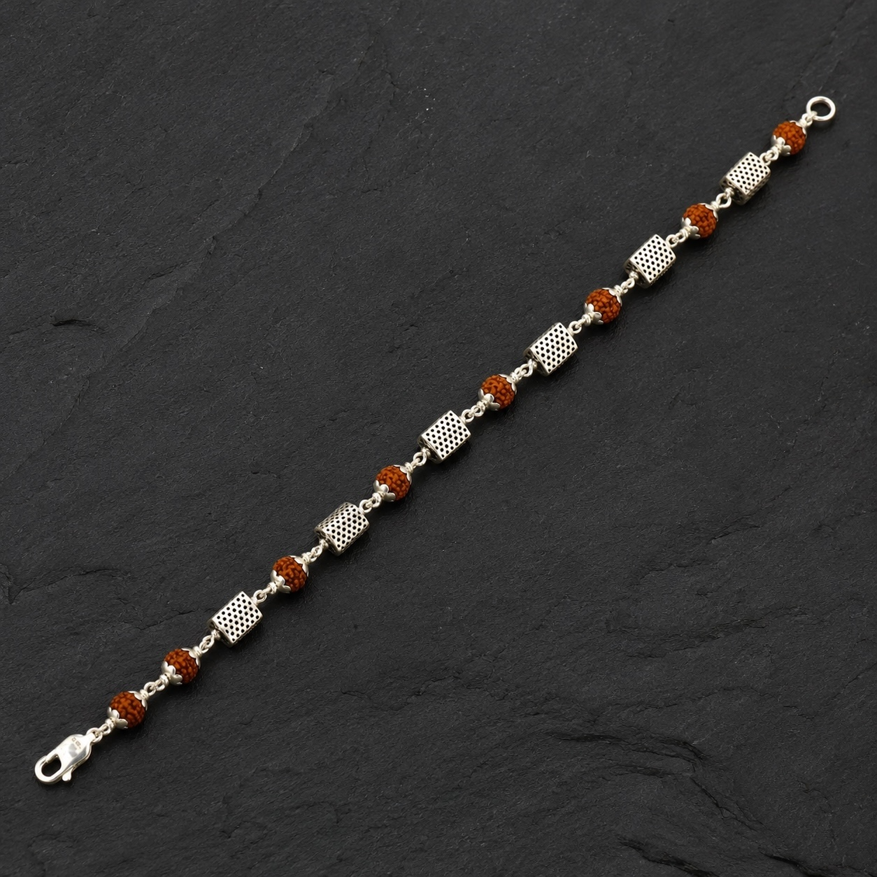 Full view of 7 Rudraksha and 7 triangle silver bead bracelet