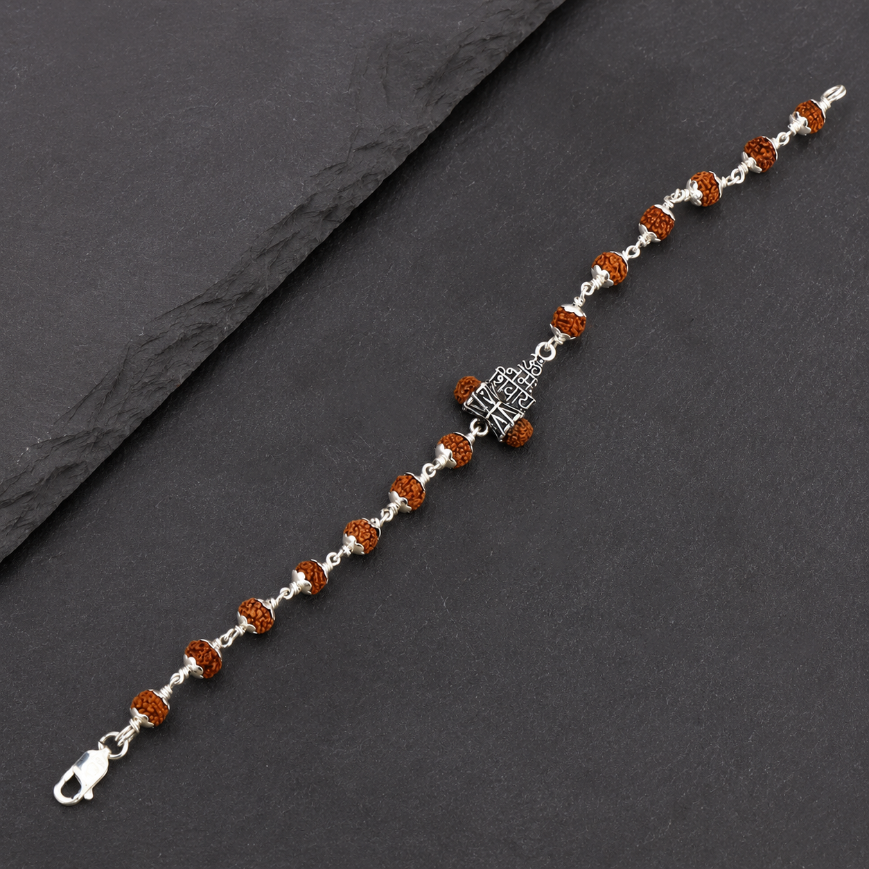 Natural Rudraksha silver bracelet with sacred Lord Shiva mantra centerpiece