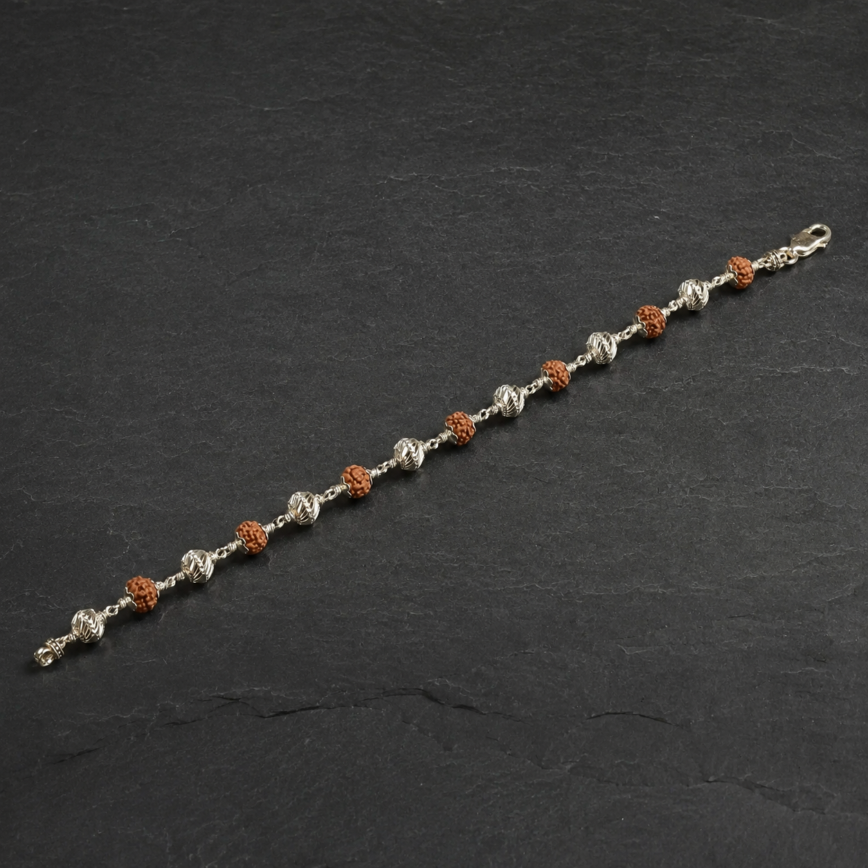 Panchmukhi Rudraksha and sterling silver bead bracelet front view