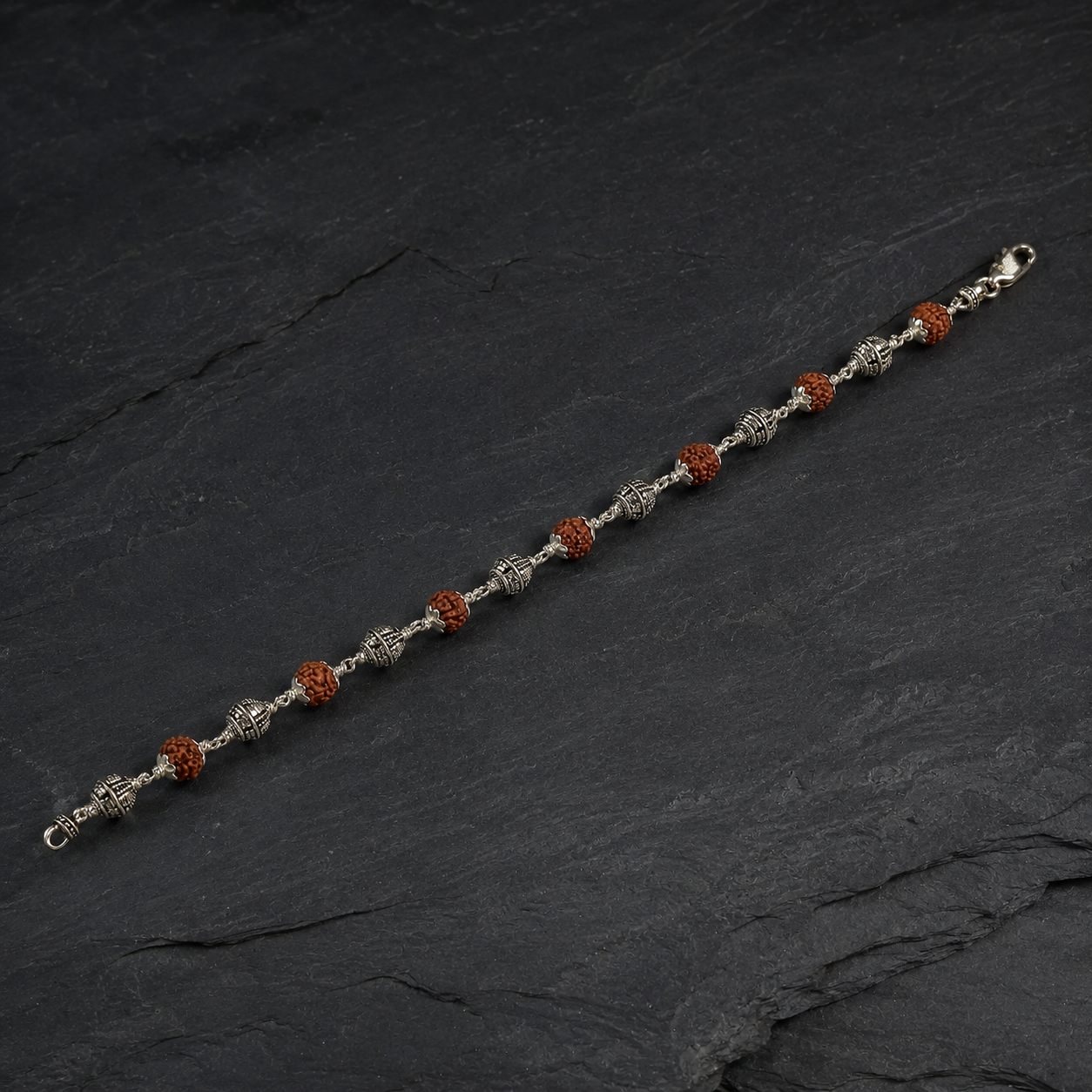 Panchmukhi Rudraksha and sterling silver Shivling bracelet front view