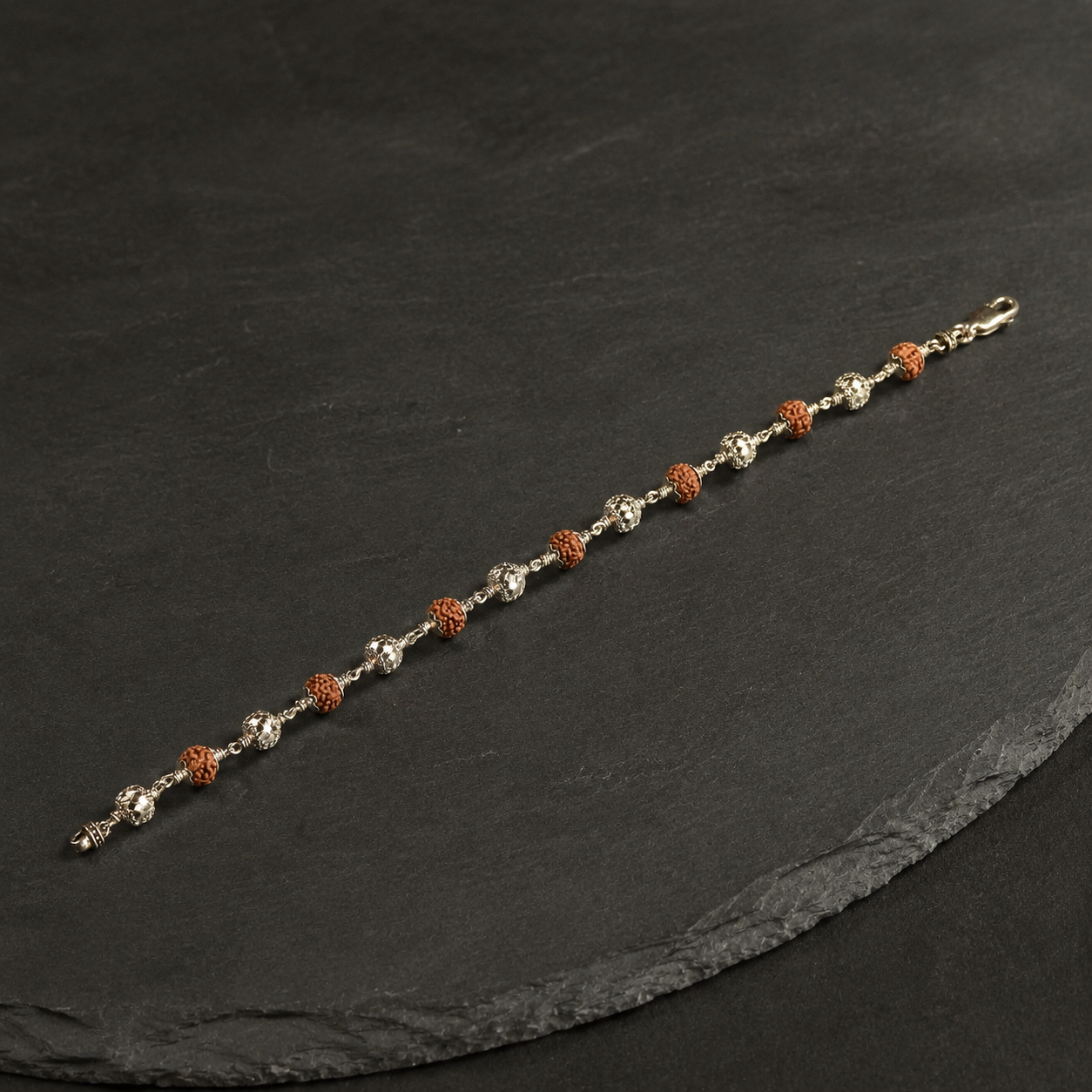 Panchmukhi Rudraksha and sterling silver bead bracelet front view