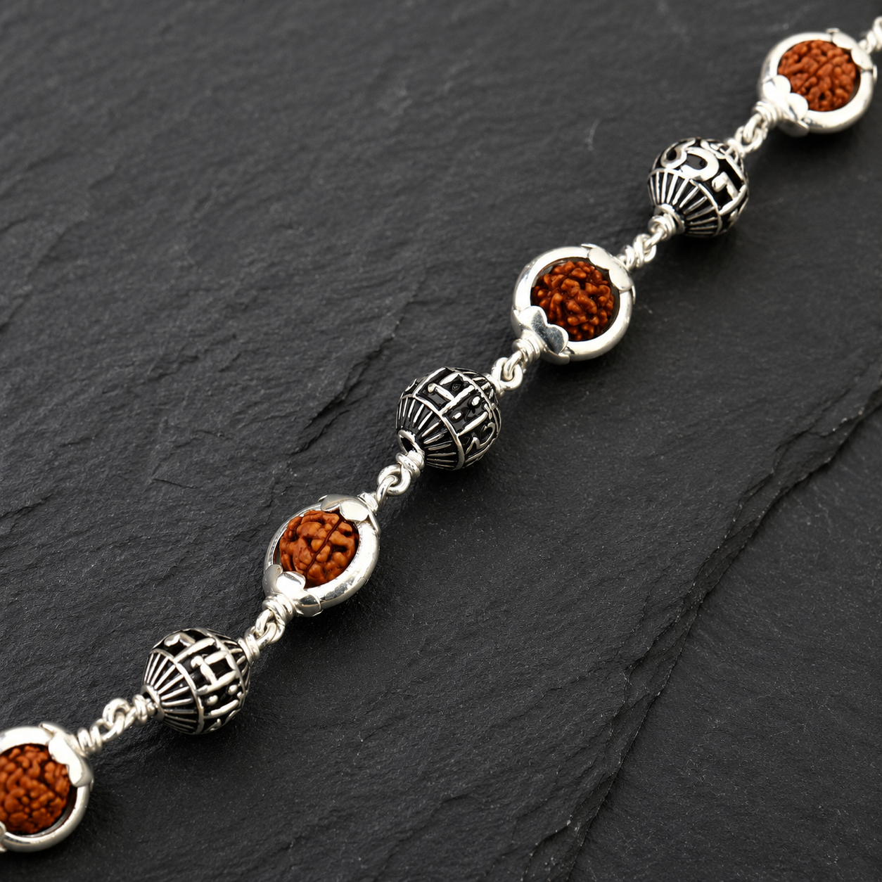 Rudraksha bracelet with six Om Namah Shivaya 925 silver beads