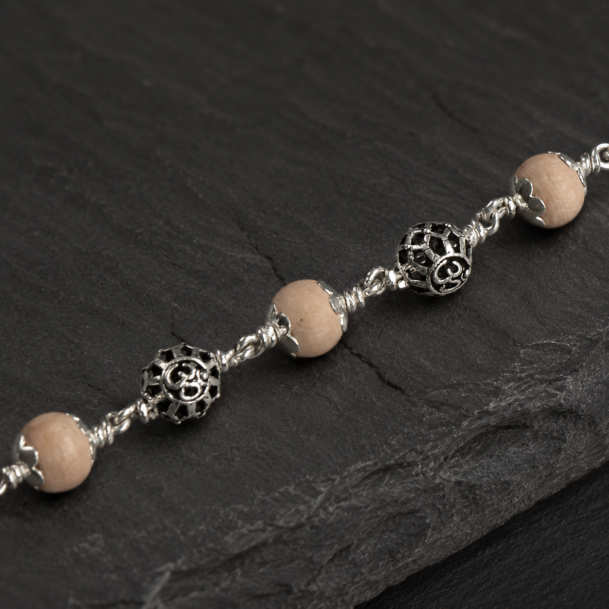 Tulsi bracelet with 925 silver round Om beads
