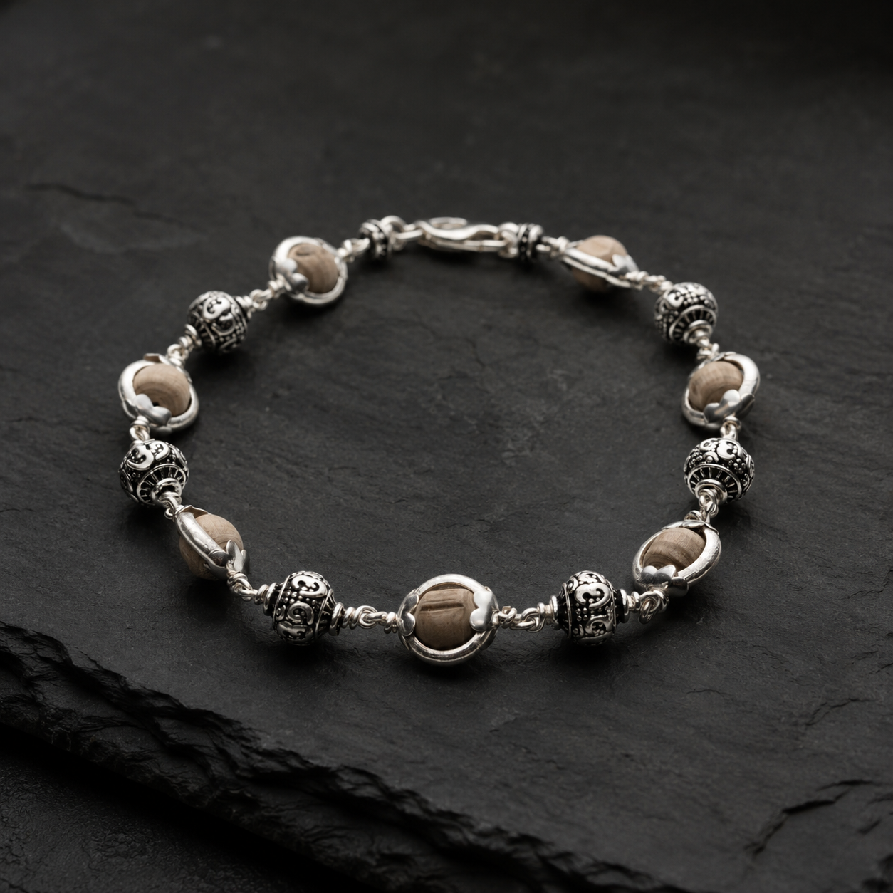 Tulsi bracelet with silver Om beads front view