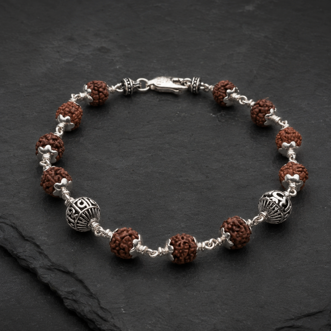 lose-up of Om Namah Shivay sterling silver bracelet beads